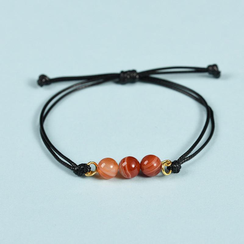 Hot-selling simple black rope Sansheng III bracelet pink crystal tiger eye stone spring design transfer bead bracelet 