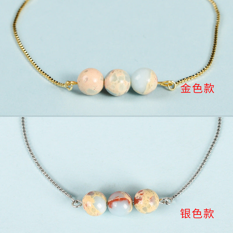 Factory direct sales, simple, fashionable and personalized Sansheng III bracelet, pink crystal tiger eye stone design transfer bead bracelet 