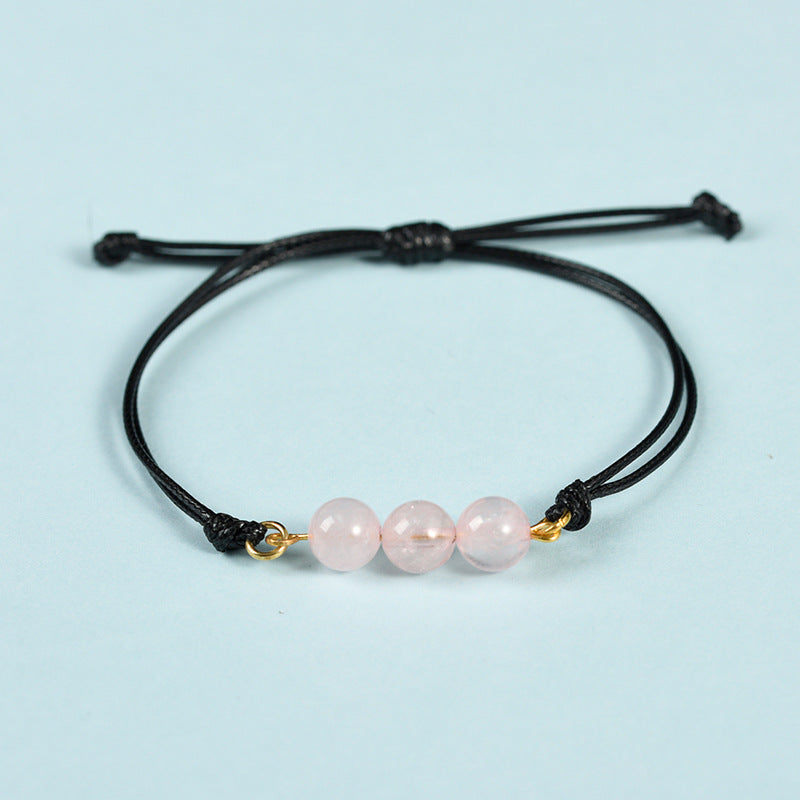 Hot-selling simple black rope Sansheng III bracelet pink crystal tiger eye stone spring design transfer bead bracelet 