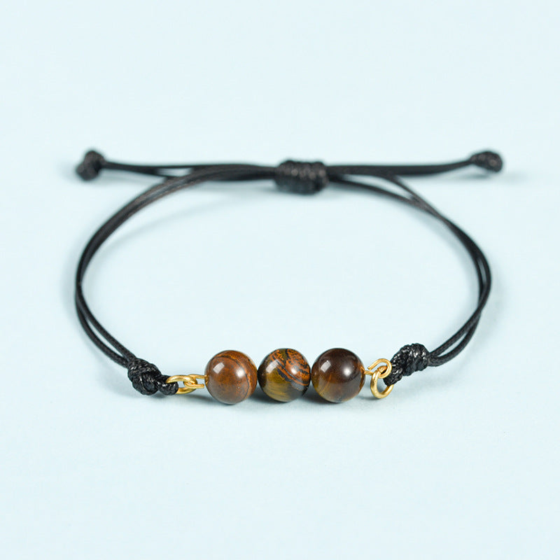 Hot-selling simple black rope Sansheng III bracelet pink crystal tiger eye stone spring design transfer bead bracelet 