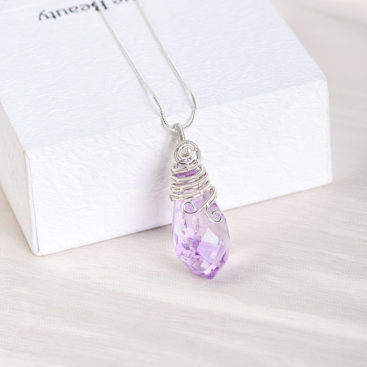 Natural crystal raw stone pendant wrapped around silk European and American pink and white amethyst fluorite high-end crystal pendulum necklace accessories 